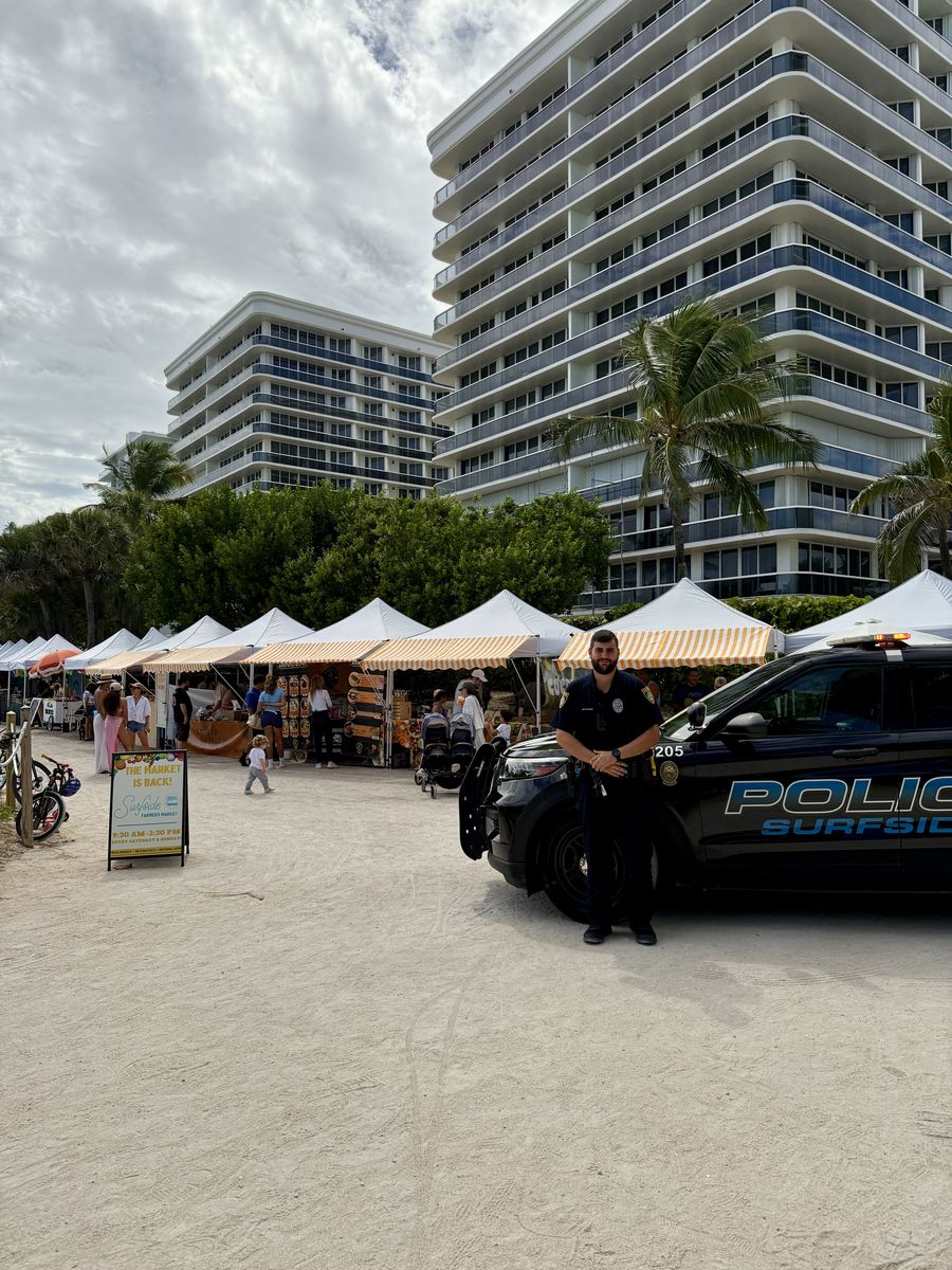Surfside Police vehicle parked beside the market